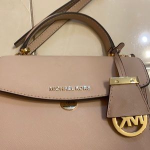 Michael Kors blush colored cross body bag